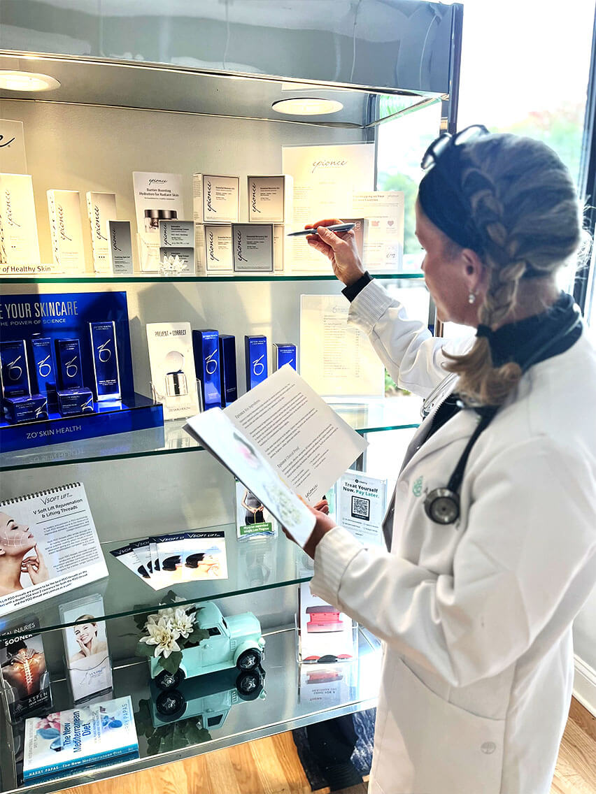 Dr. Amy Blasen holding a book